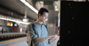 man in front of a vending machine
